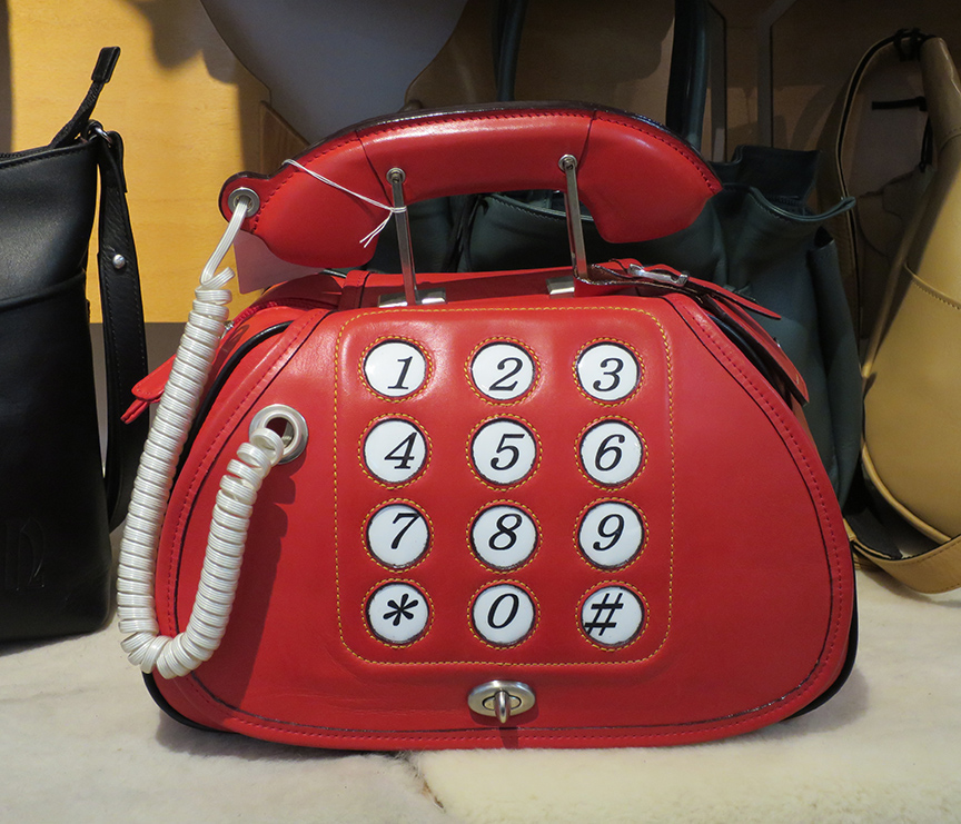 This leather goods shop sells wonderful regular purses as well as one that look like telephones and slices of watermelon.