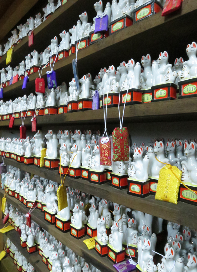 This shrine is well known as a power spot, as you can see by the number of fox figures offered here.