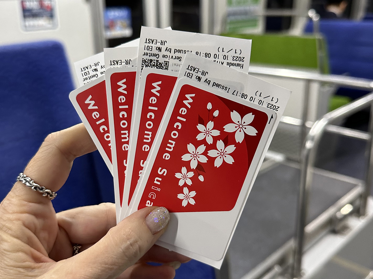 Where do I get a visitor transit card at Haneda Airport?